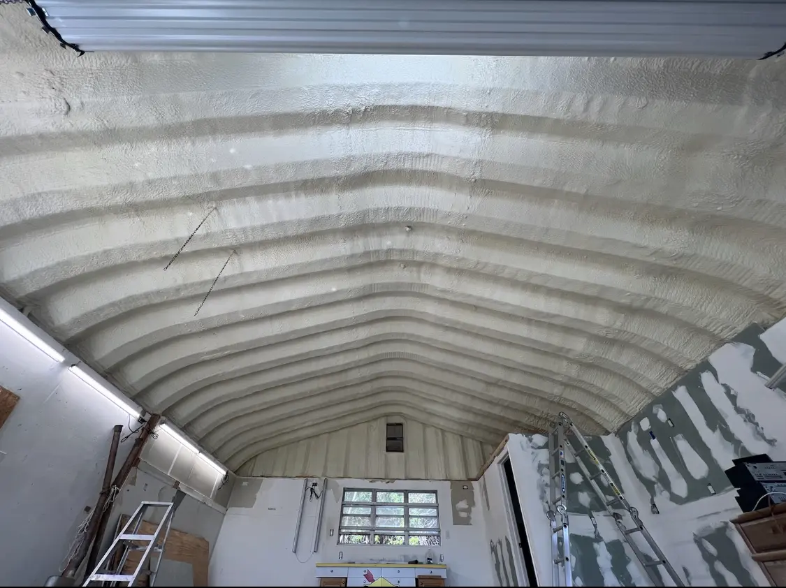 Spray polyurethane foam applied to the underside of a metal roof deck in Orlovista